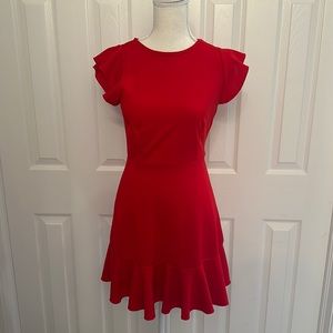 XS fitted red dress with ruffle sleeves and single layer ruffle skirt. Worn 1x